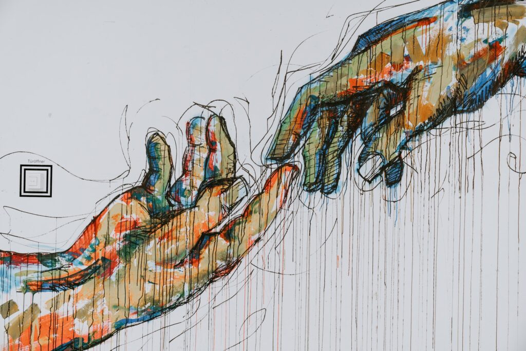 Sketch of hands reaching out toward each other, touching at the fingertips