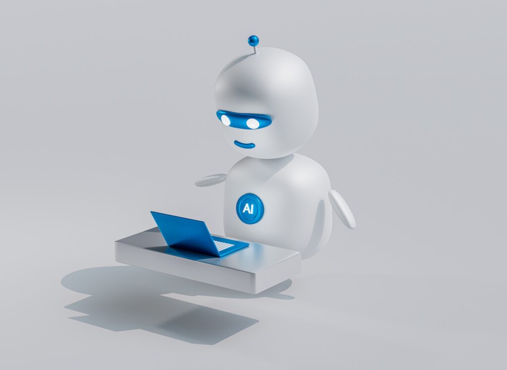 An animated white robot with blue trim and the letters AI on its chest stands behind a floating desk with a blue laptop