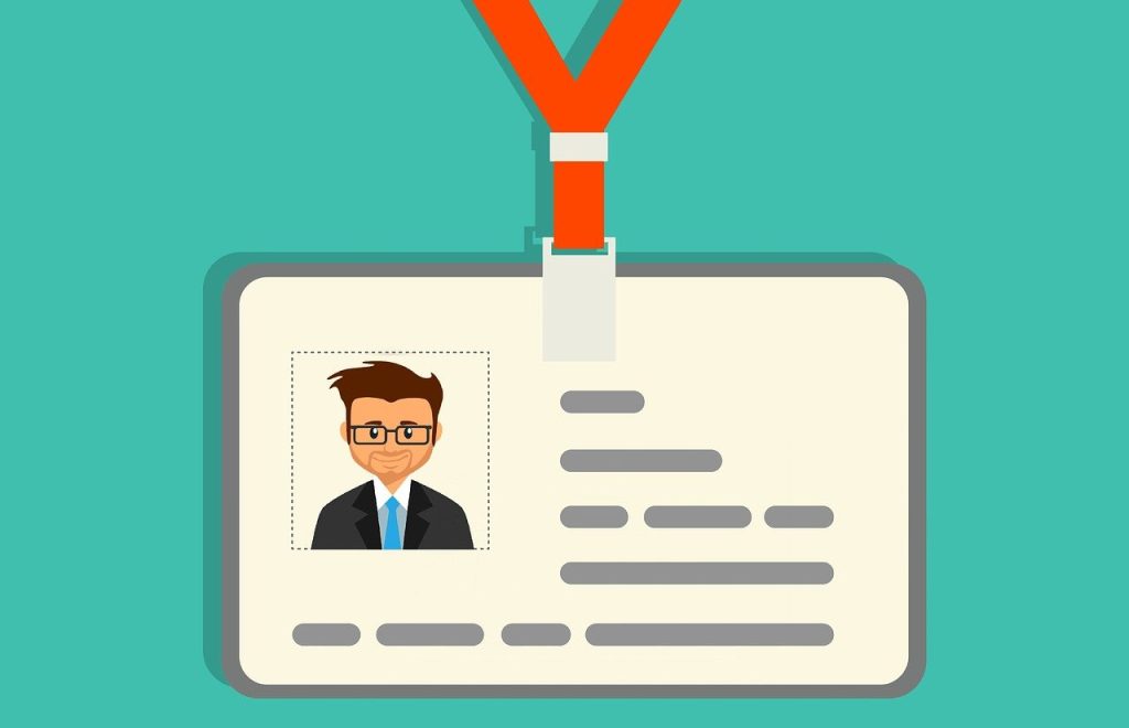 Illustrated image of an employee ID badge hanging from an orange lanyard